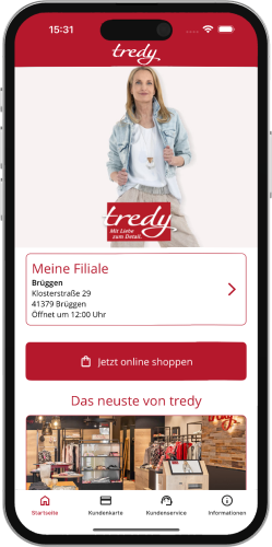 iPhone showing the home page of the new tredy Fashion app, with the tredy logo in the navigation bar, below it a picture of a woman with the tredy logo, below that information about the Brüggen store, below that a button with a shopping cart symbol and the label “Shop online now” and a headline “The latest from tredy.”